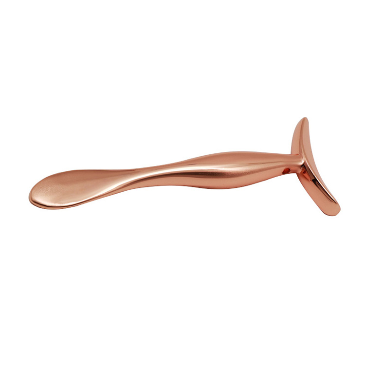 ʻO ke ʻano U-like ʻo Rose Gold Metal Facial Cosmetic Essentials Cream Massager Stick
